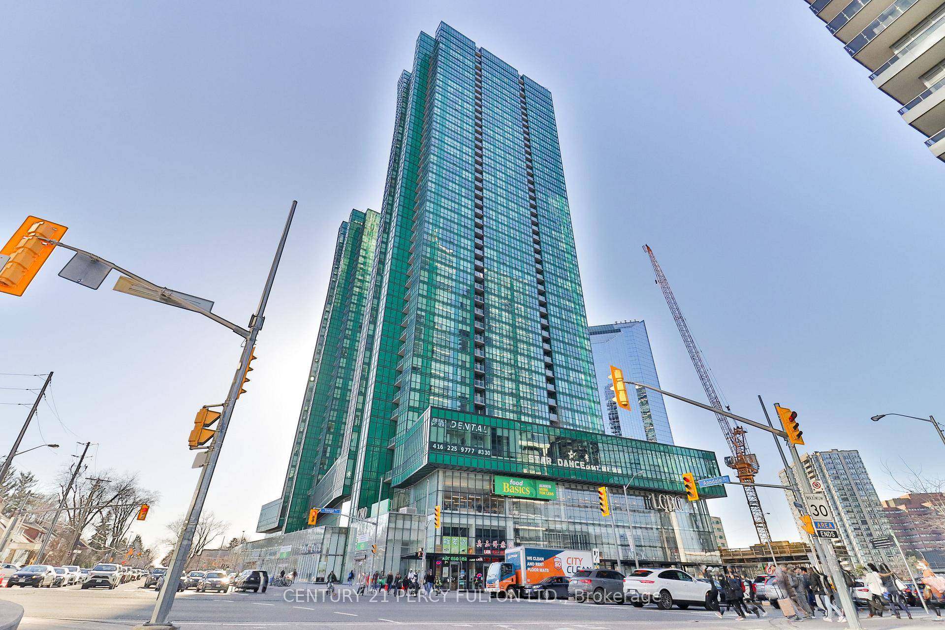 Welcome to the iconic emerald towers rising above Yonge and Sheppard, with a sleek glass exterior and contemporary design.