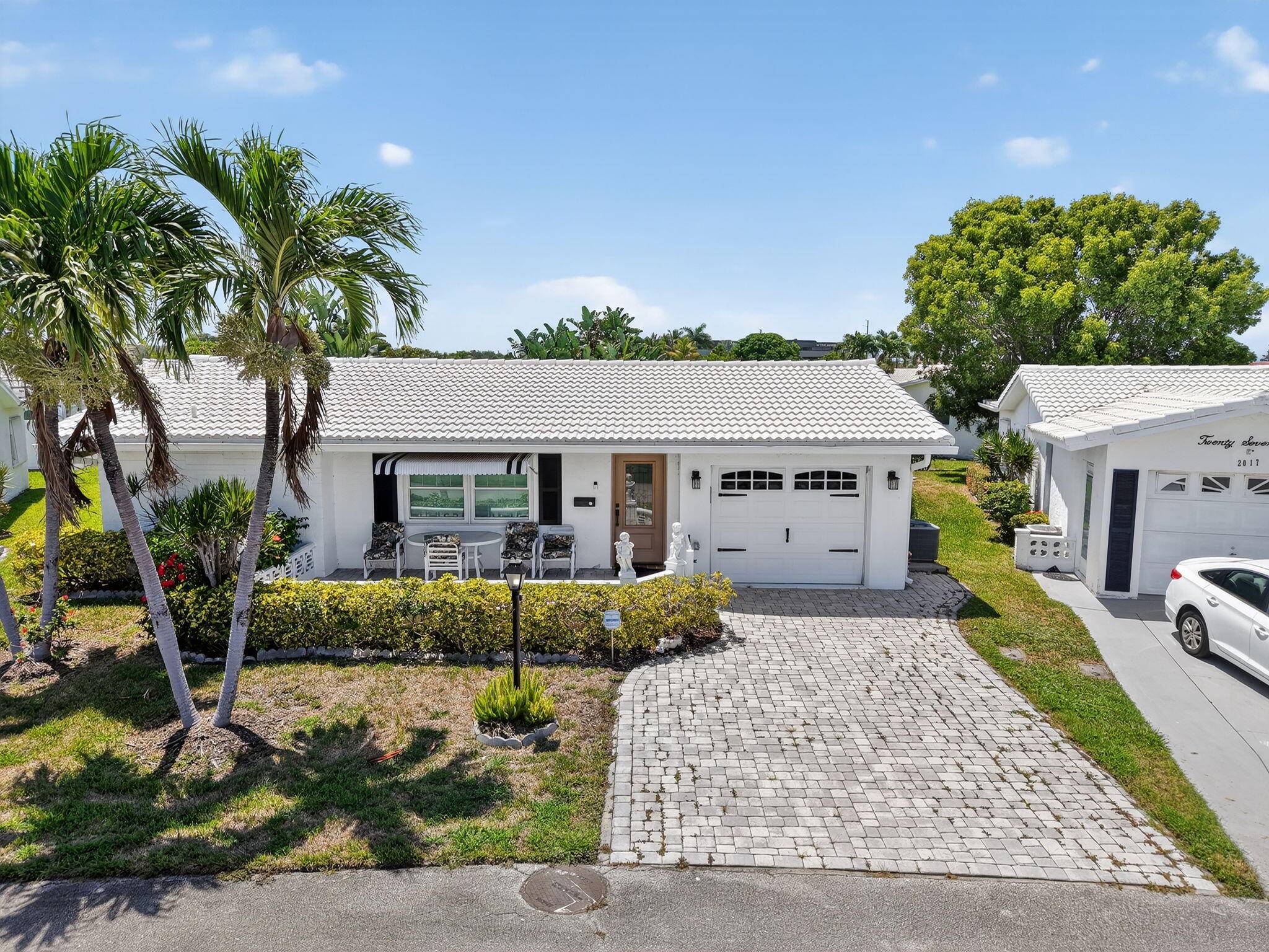 Welcome to 2019 Vastine Dr, located in a desirable 55 community in the heart of Boynton Beach.