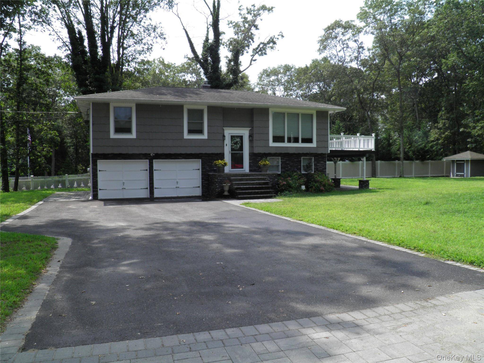 Diamond Home with many updates in the Heart of Smithtown Pines.