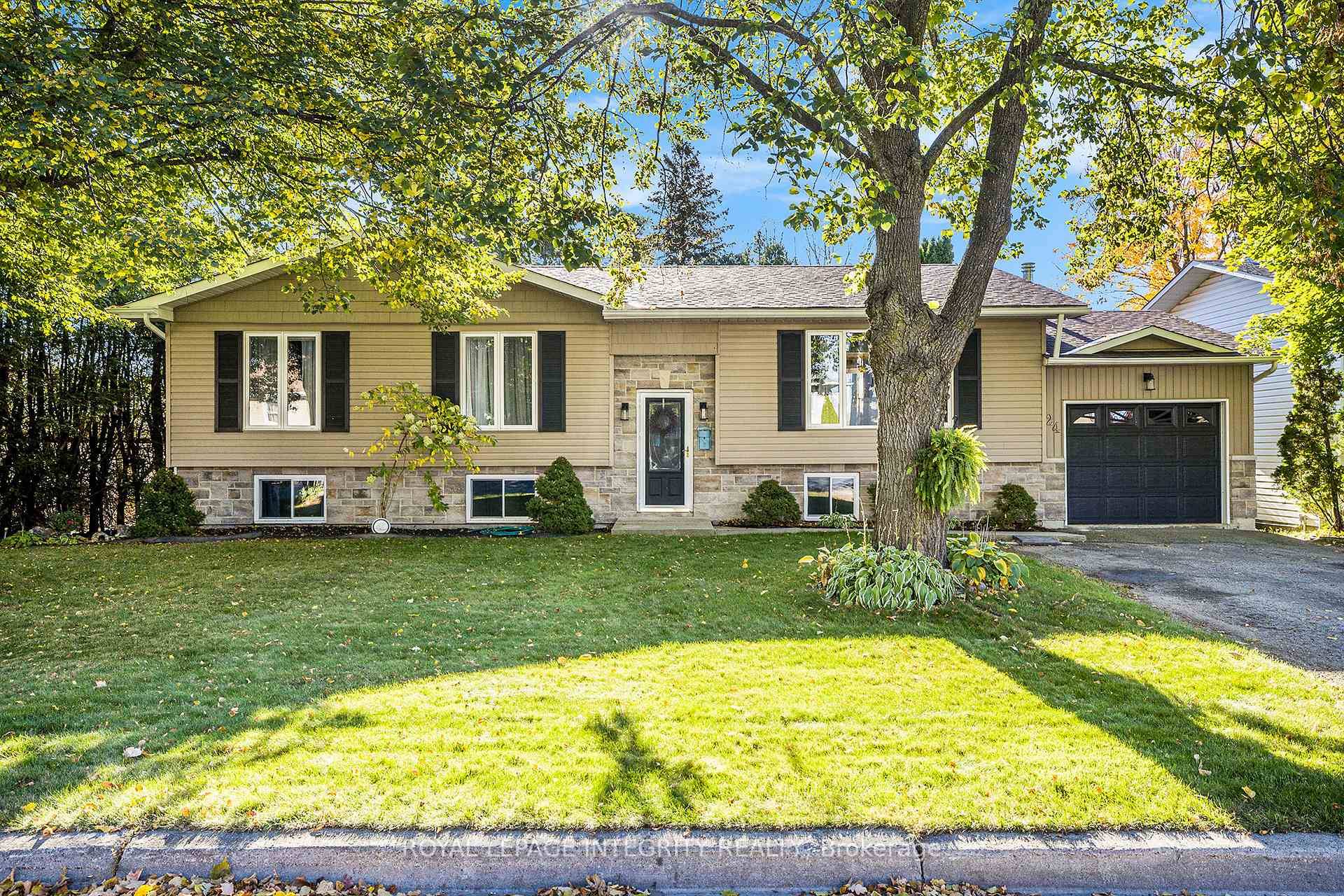 This impeccably maintained home shows pride of ownership from the tasteful landscaping in front and back yards to the gleaming engineered hardwood through out most of the main floor.