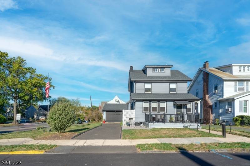 This beautifully renovated colonial sits on a LARGE CORNER LOT.