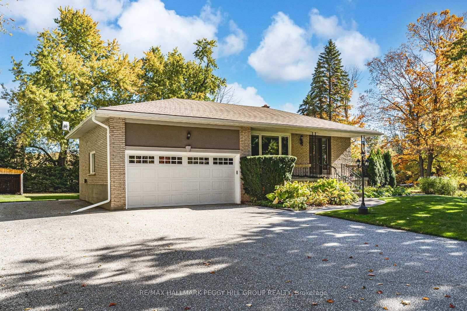 EXPERIENCE COUNTRY LIVING WITH BEAUTIFUL MODERN UPDATES ON A PICTURESQUE 1.