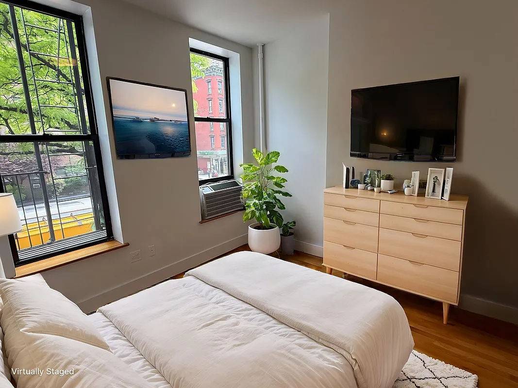 Live in the heart of Hells Kitchen in this stunning, sun drenched two bedroom featuring Modern finishes, stainless steal appliances, and ampul closet space.