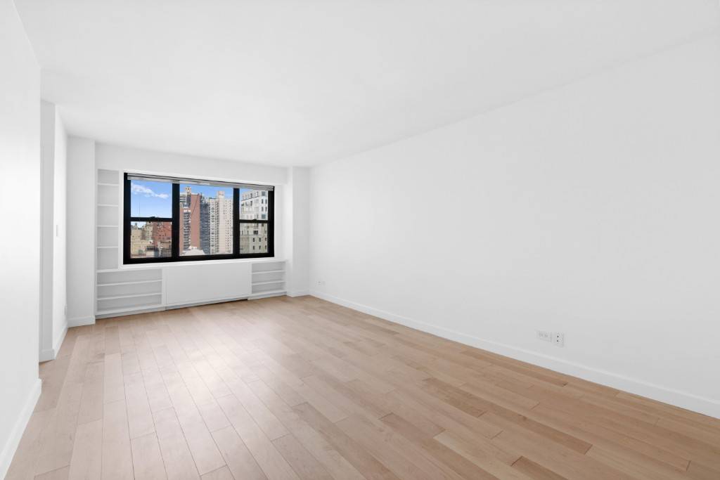This large fully renovated 1bd, 1 bath on the 18th floor, corner UES unit is a perfect place to call home or for investment.