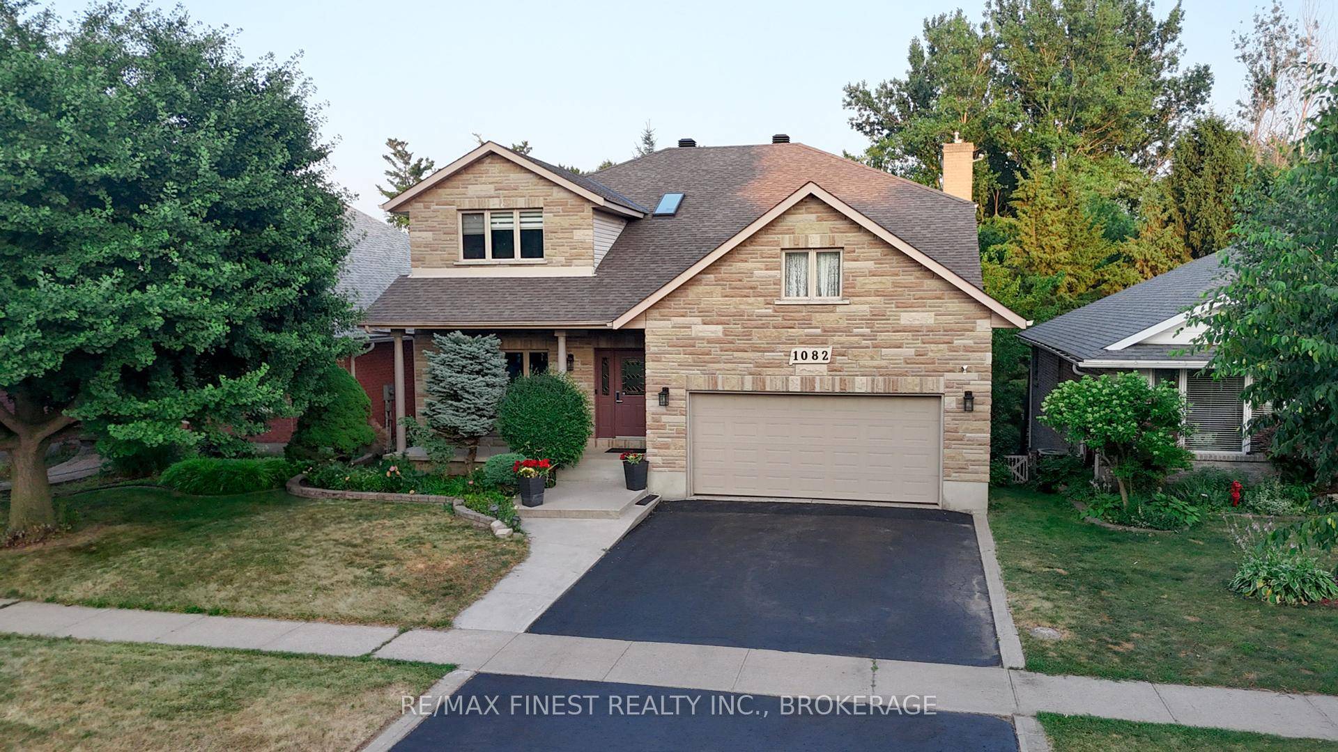 Prime West End Gem Backing Onto Private Green Space !
