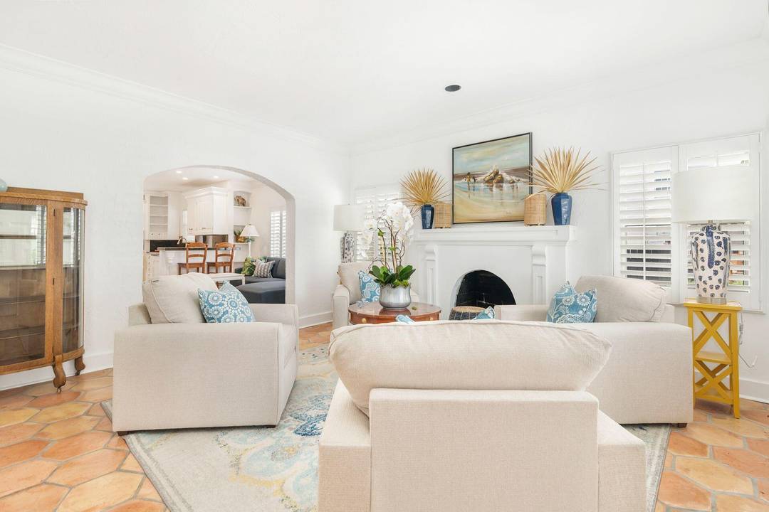 Resting on an oversized property on the Intracoastal block in coastal West Palm Beach, this updated 1920's home offers 3 bedrooms and 2.