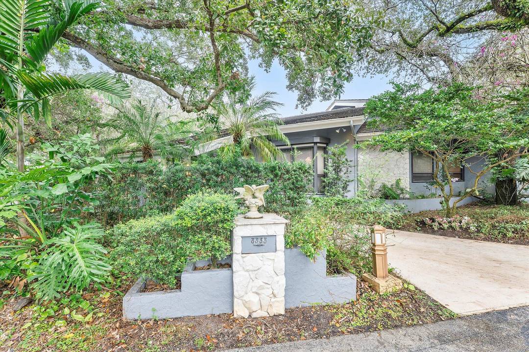 Cherished by the original owners and nestled in the prestigious Arapahoe Farms, an established and sought after gated community in Hollywood Fort Lauderdale, FL, this home is the perfect blank ...