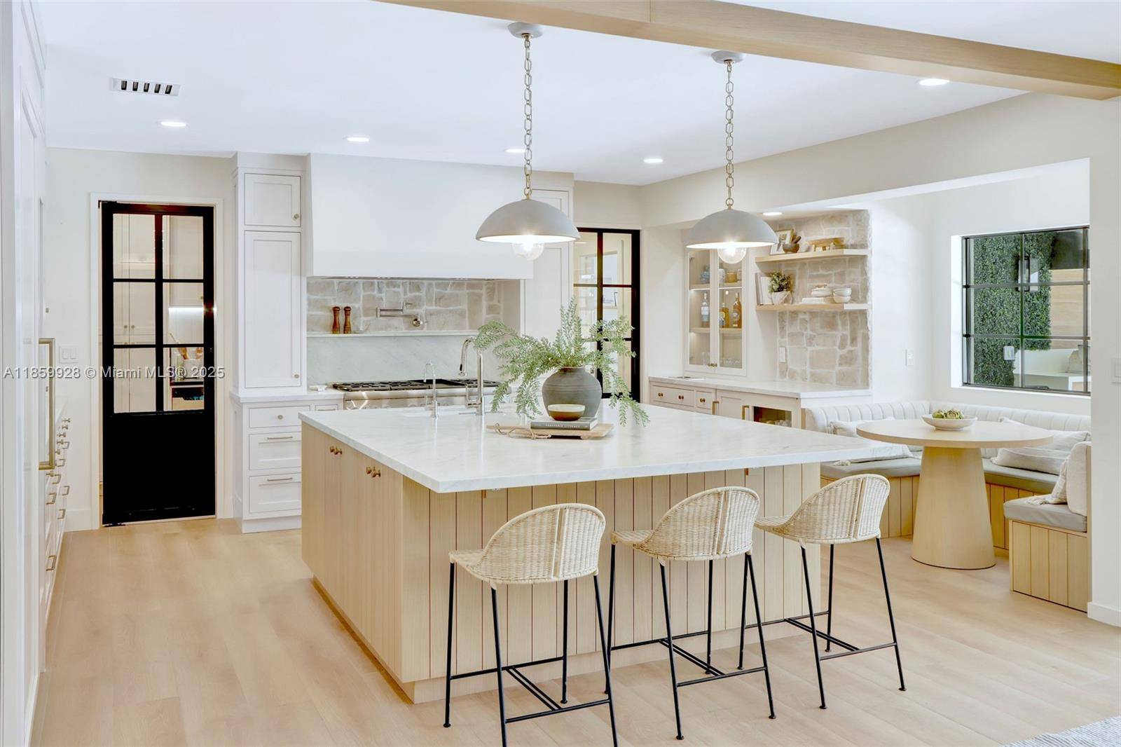 Stunningly updated Pinecrest home designed for connection, comfort, and warm weather entertaining.
