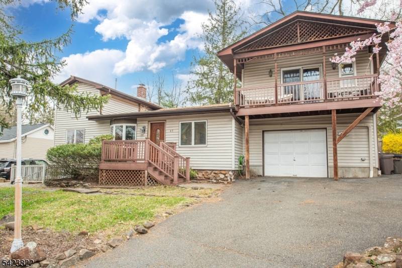 Beautiful Packanack Lake home featuring a desirable split floor plan.