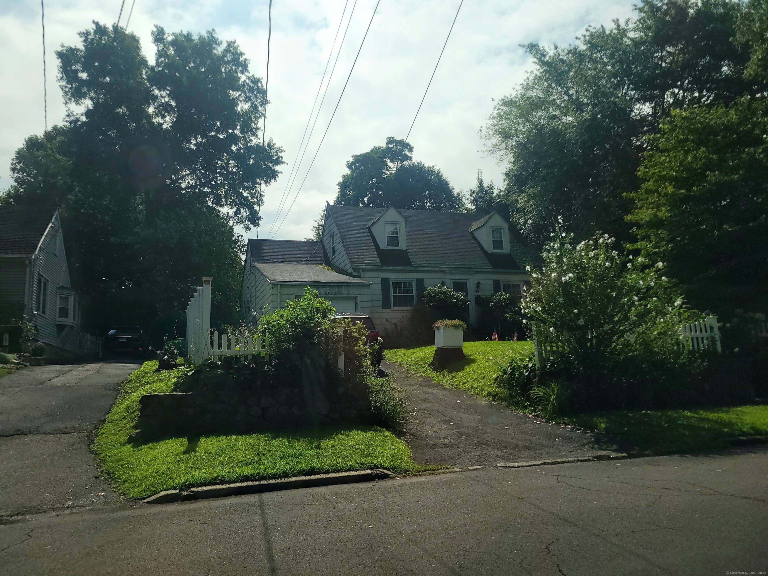 Opportunity awaits in this expanded Cape style home located in the heart of sought after Springdale !