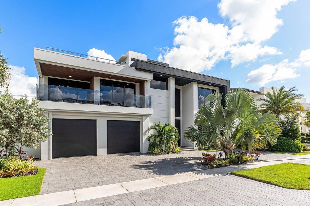 Built in 2023 by Primo Construction, this striking three story modern estate in Boca Villas offers 6 bedrooms, office, 6.