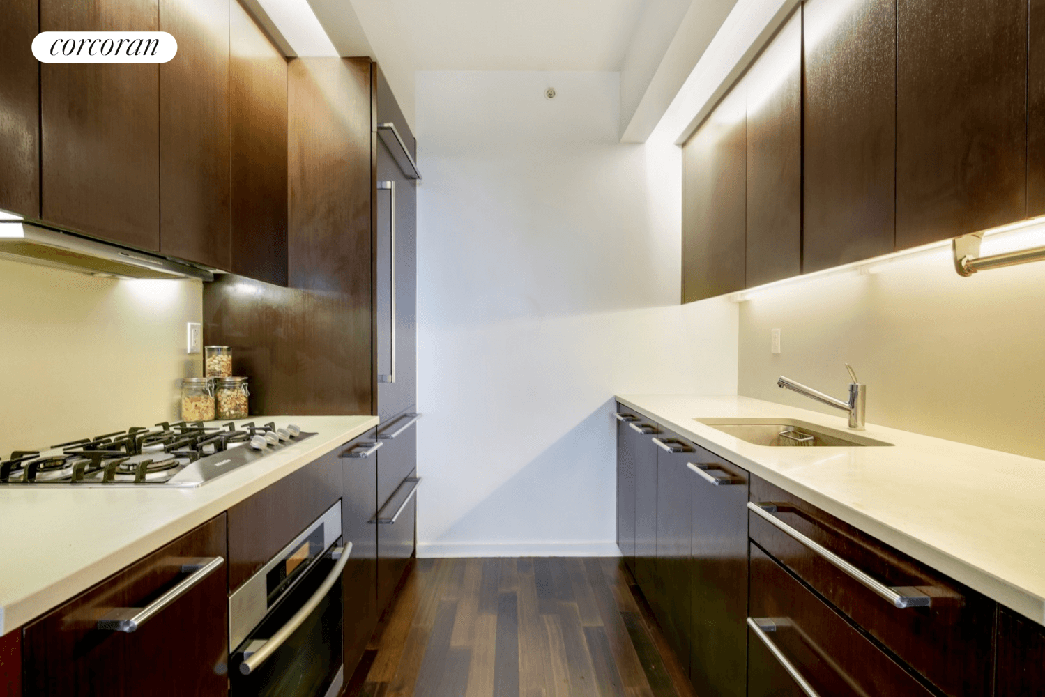 This sun drenched, two bedroom, two bathroom corner residence is a serene and private retreat for those who appreciate natural light and refined design.