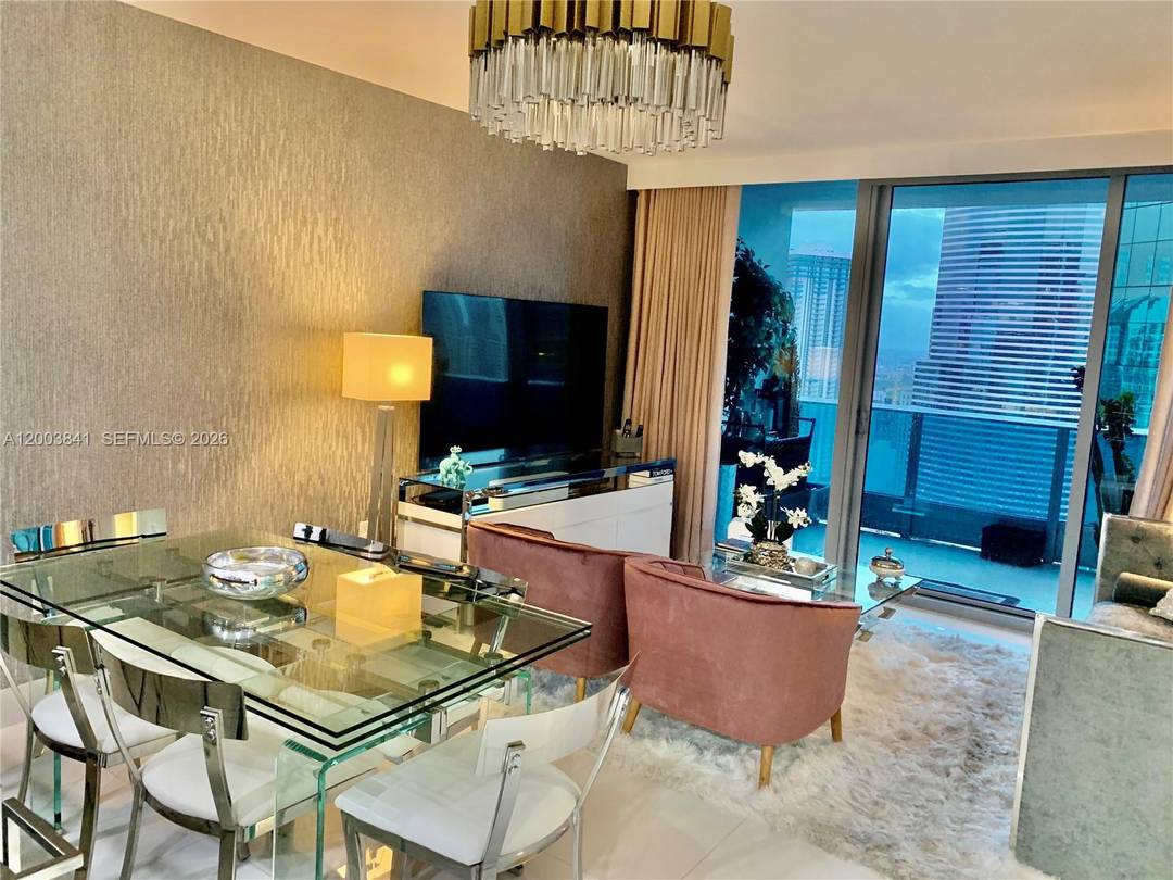 Luxurious unit ! Featuring Versace wallpaper, 3D walls, blackout shades, and motorized fabric curtains.