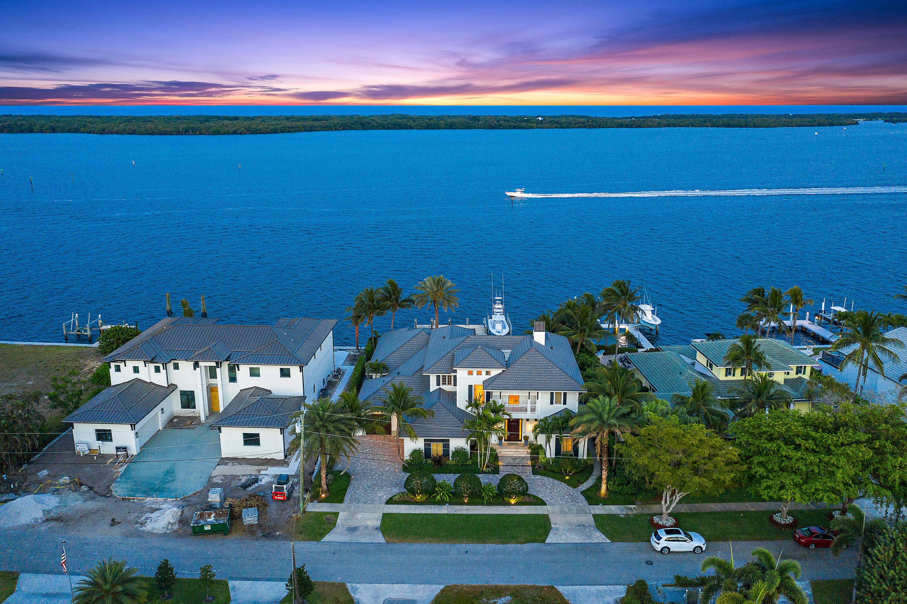 This waterfront estate designed by Randall Stofft and built by renowned builder Turtle Beach Construction is the definition of refined luxury living in one of the most desirable North Palm ...