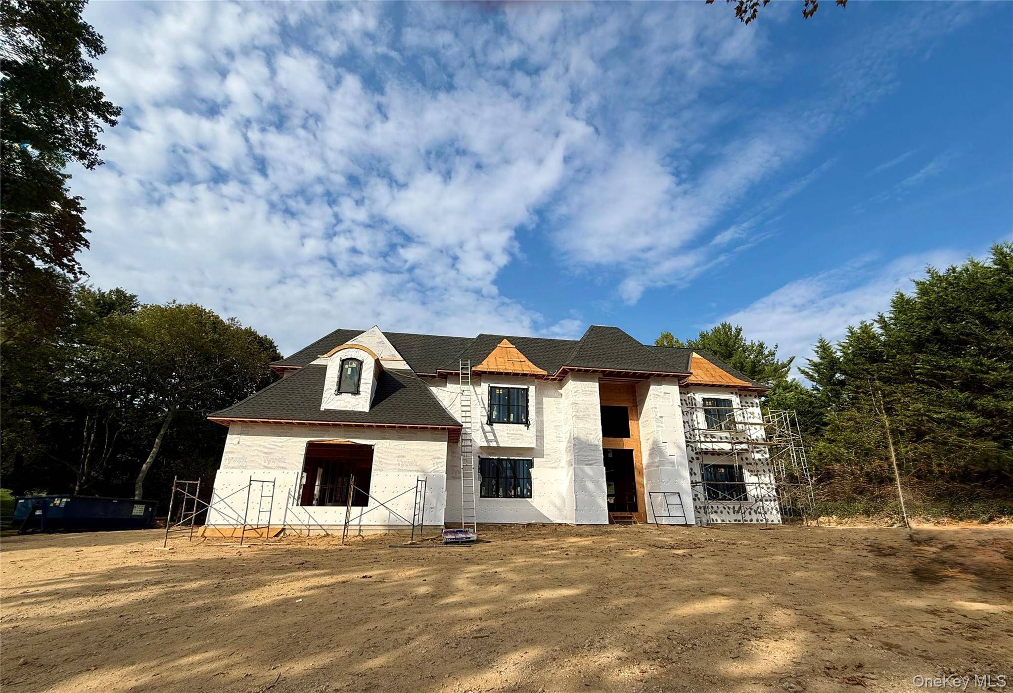 Welcome to this brand new, masterfully designed estate by Piazza Custom Builders, nestled on a tranquil, tree lined street in the heart of Dix Hills.