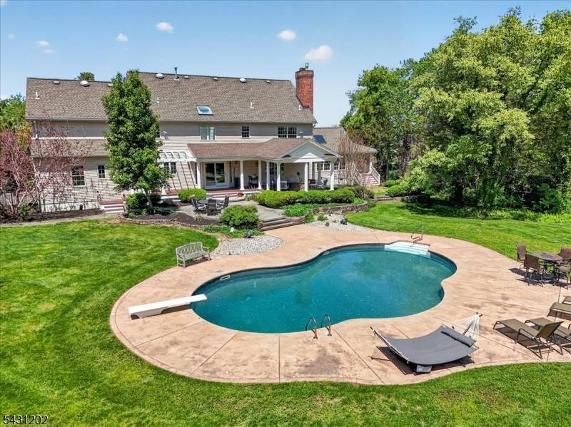 Situated at the end of a peaceful cul de sac in desirable Hillsborough Township, this exceptional estate style home offers the perfect blend of privacy, elegance, and everyday comfort.
