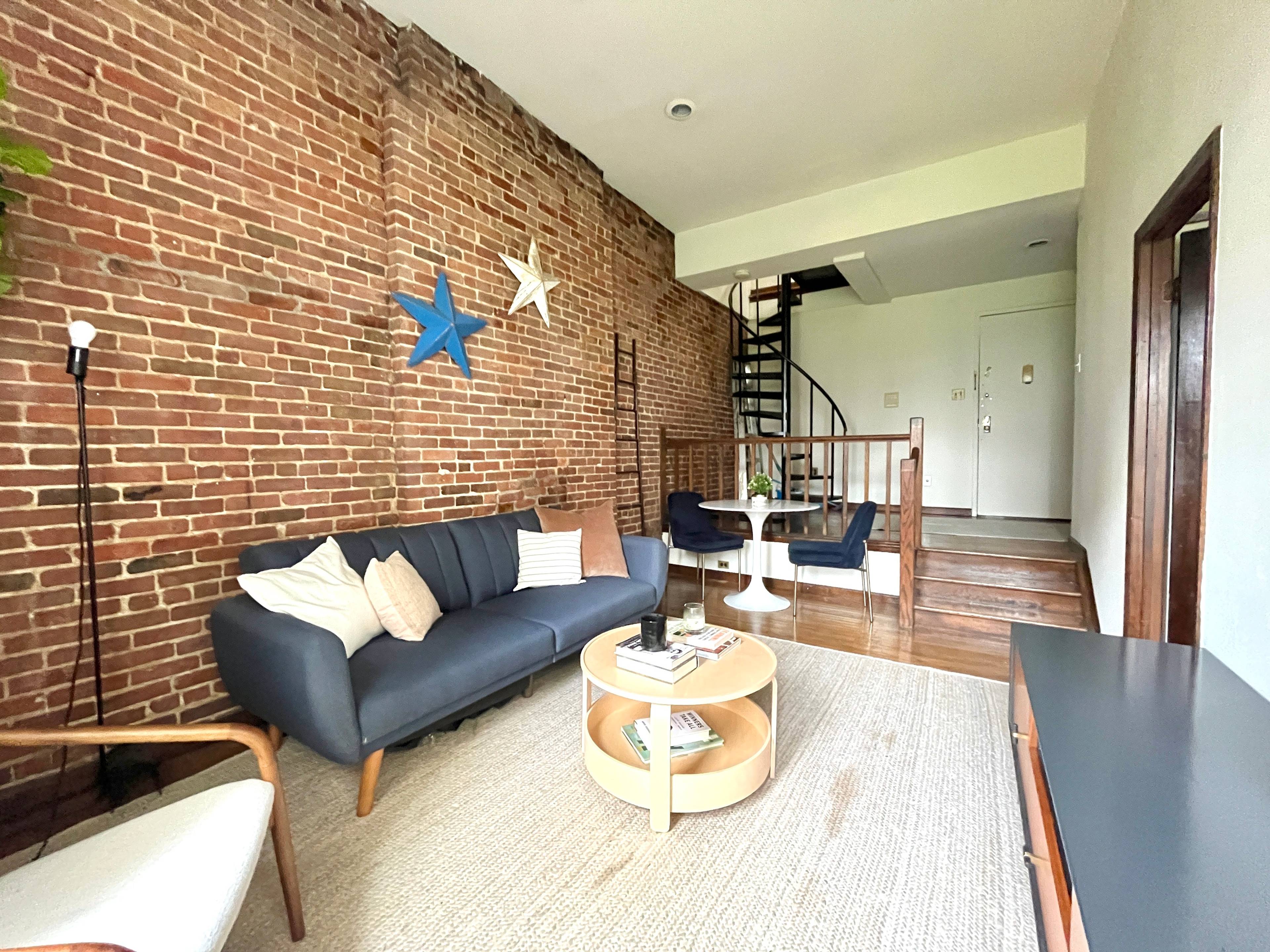 Top Floor duplex one bedroom plus windowed home office and private roofdeck.
