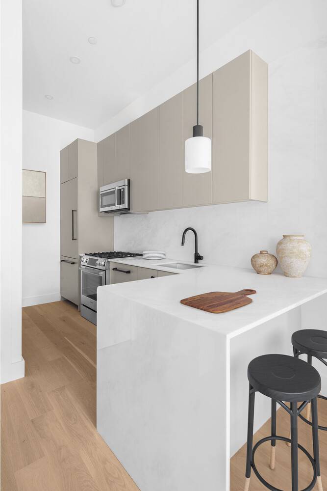 Welcome to 696 Chauncey Street, a one of a kind five unit condominium in the heart of Bushwick.