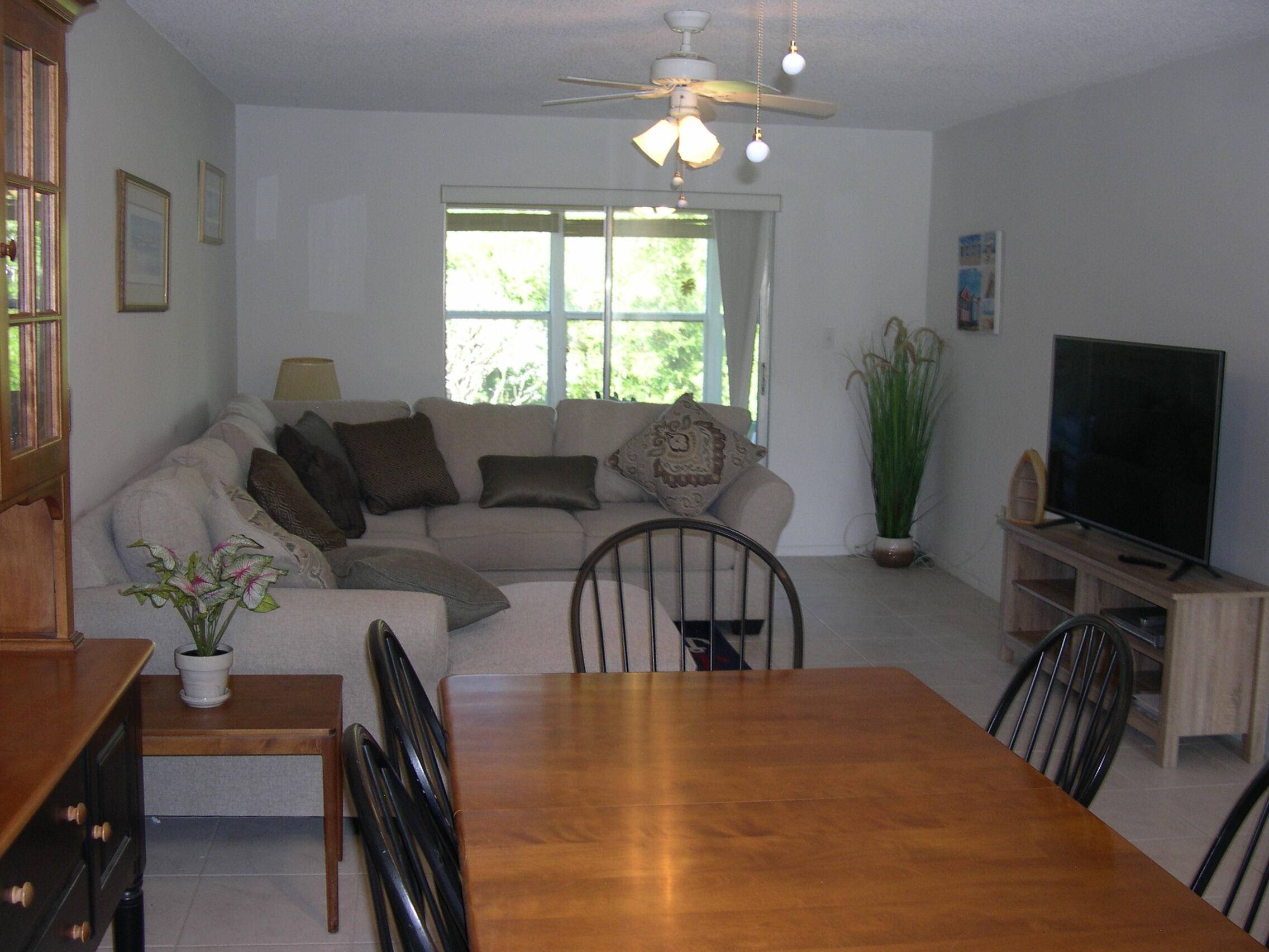 Air conditioned balcony Florida Room serves as a second bedroom, has a beautiful garden view and can be accessed thru large sliding glass doors from the Living Room and the ...
