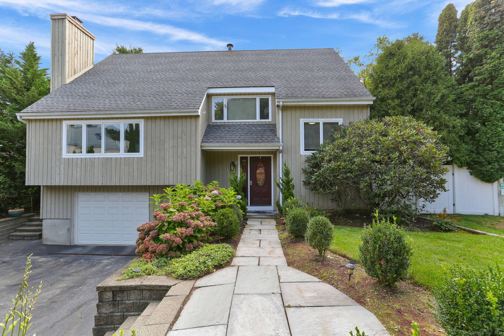 Discover this stylish contemporary home in Westport's highly desired Saugatuck area just a 7 minute walk to the train station, making it a commuter's dream.