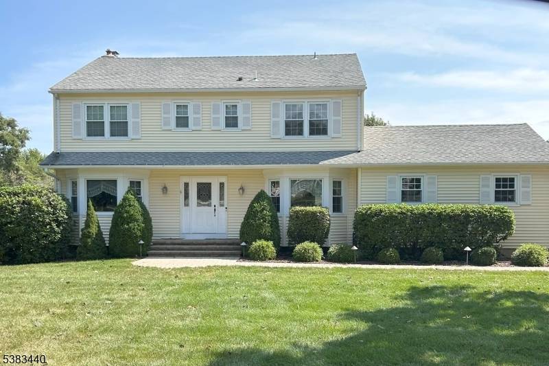 Tucked quietly at the end of a cul de sac and backing to peaceful open space, this well loved 4 bedroom, 2.