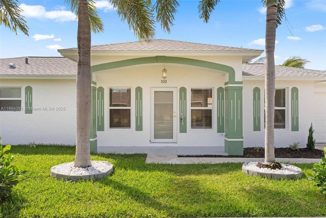 Completely rebuilt, this stunning 3 bedroom, 2 bath home is situated on a corner lot.