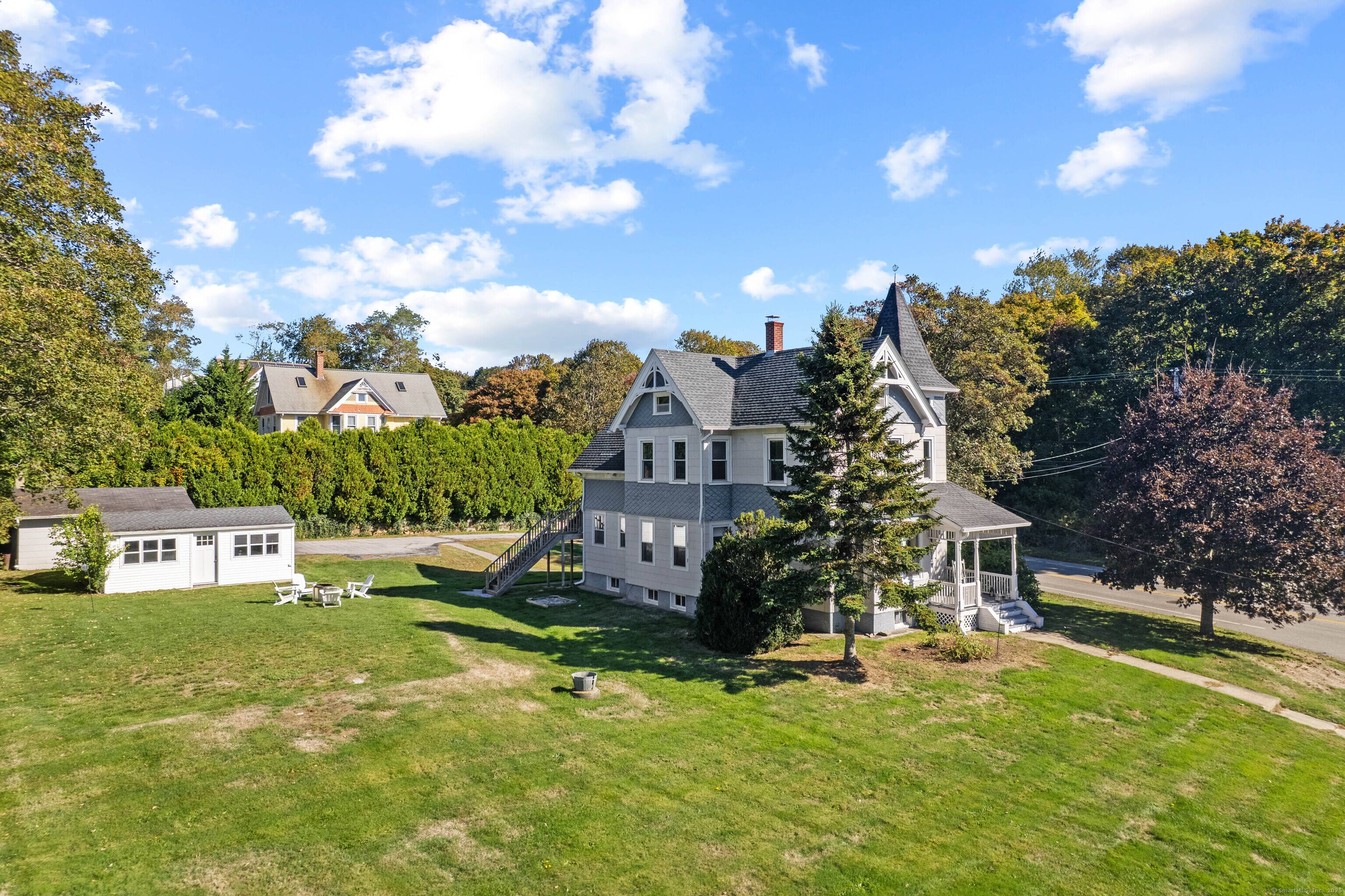 Charming Victorian home offers timeless appeal and spacious living on over half an acre of land.