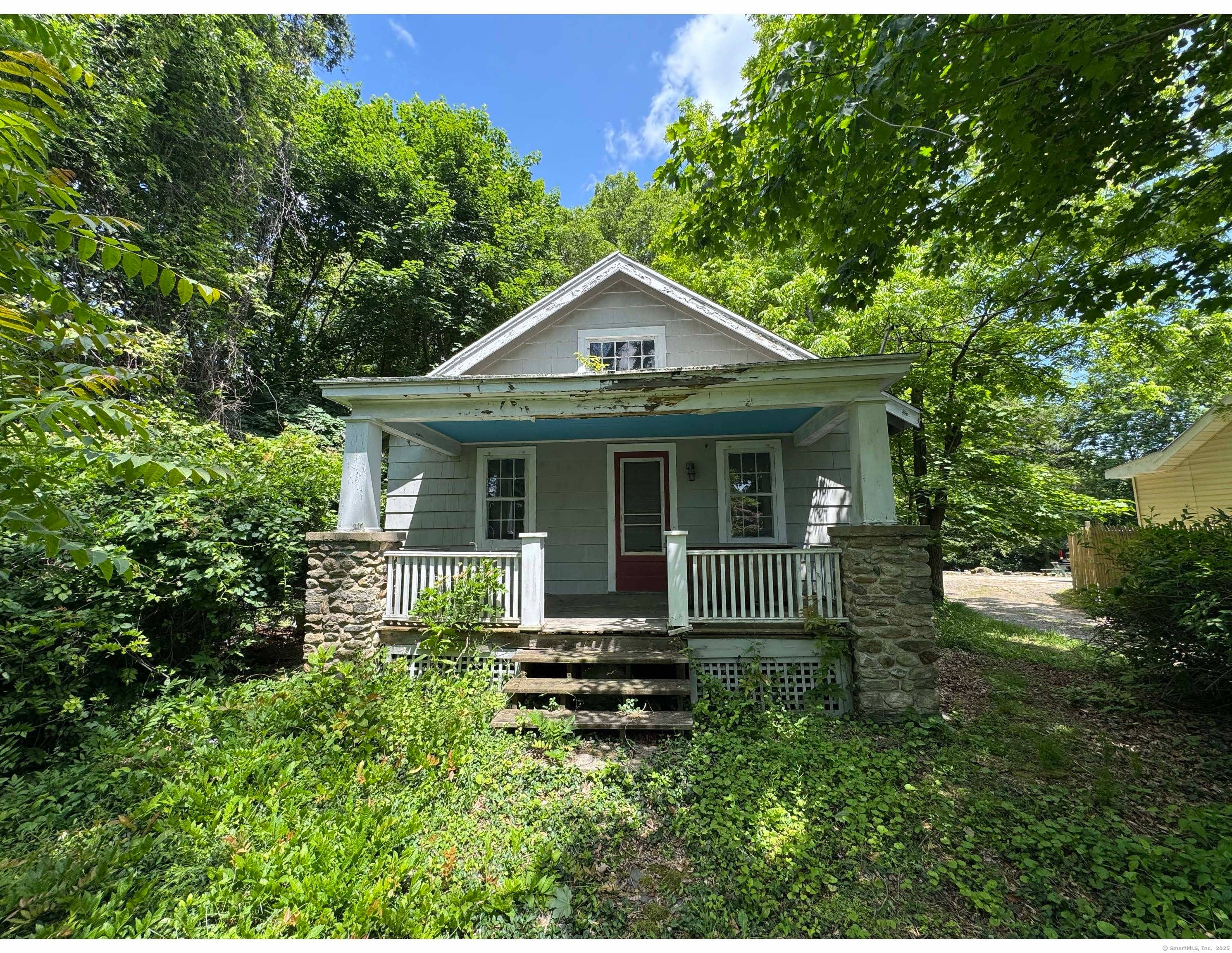 Double Lot Unbelievable opportunity to build your dream home or subdivide into two parcels possibilities are endless at 142 Wolfpit Avenue.