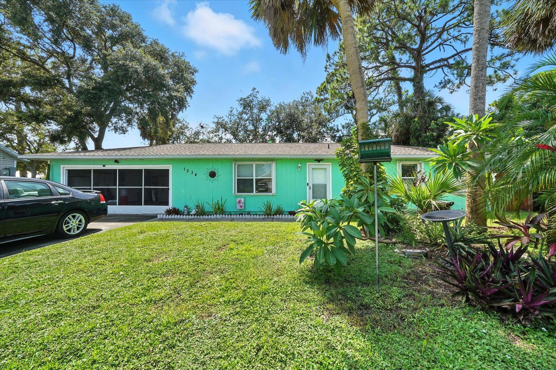 Cute partially updated 2 bed 2 bath with recent roof, HVAC on City water and sewer and a large screened lanai.