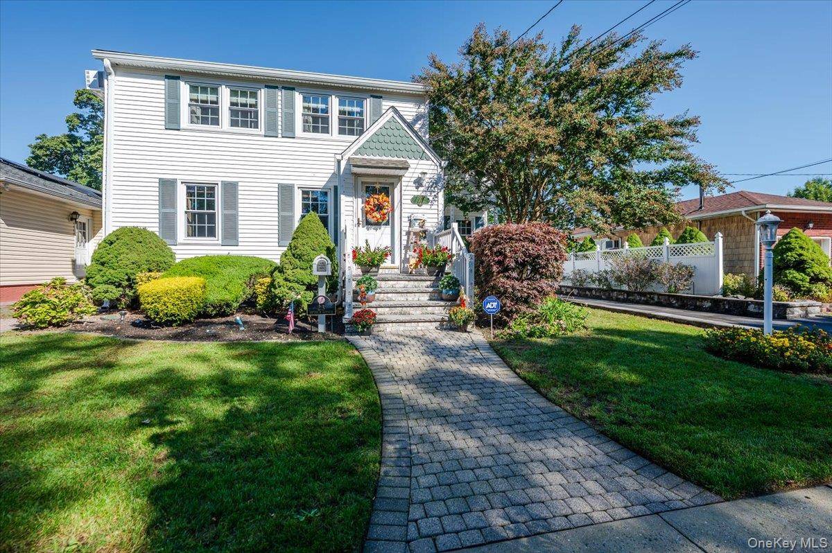 Welcome to this beautifully maintained Colonial style home that truly has it all !