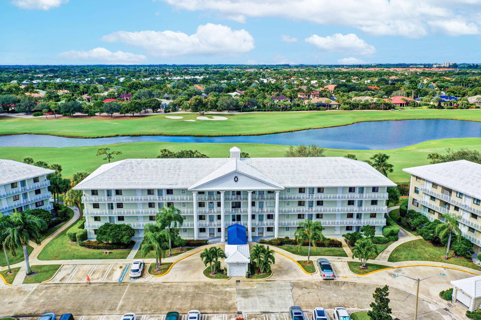 Enjoy South Florida living from this desirable 1st Floor CORNER unit in the well established community of Whitehall.
