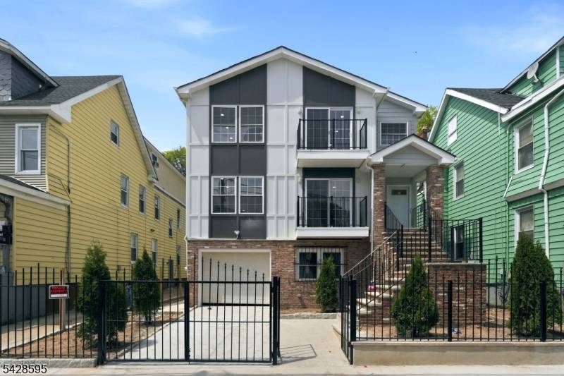 Here we go again, another unique and beautifully crafted new construction set on a 40 x 100 lot, thoughtfully designed to maximize square footage across the apartments, basement, and outdoor ...