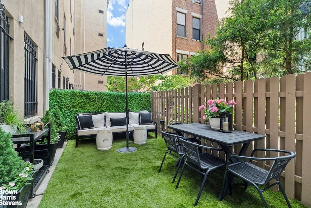 A private patio, leafy park views, elegant upgrades, and historic townhouse style living in a Manhattan home with carrying costs a fraction of comparable full floor apartments in the Upper ...