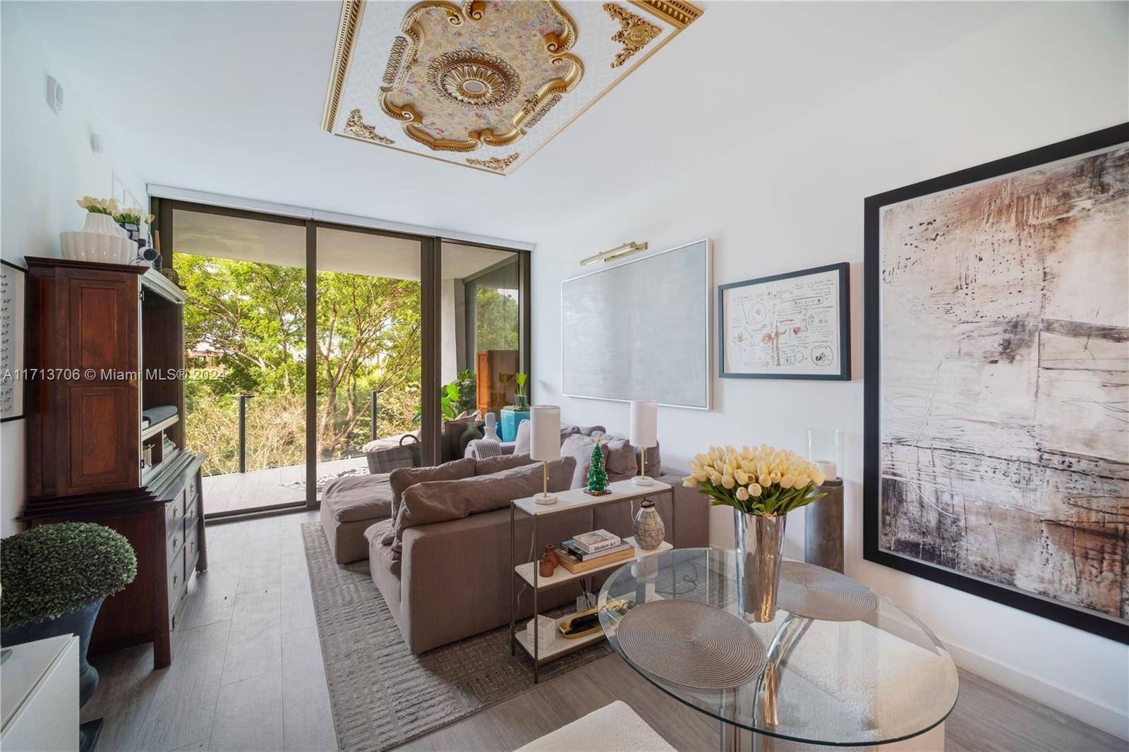 Welcome to an exquisite residence in the prestigious Club Residences at Park Grove, Coconut Grove's premier luxury community.