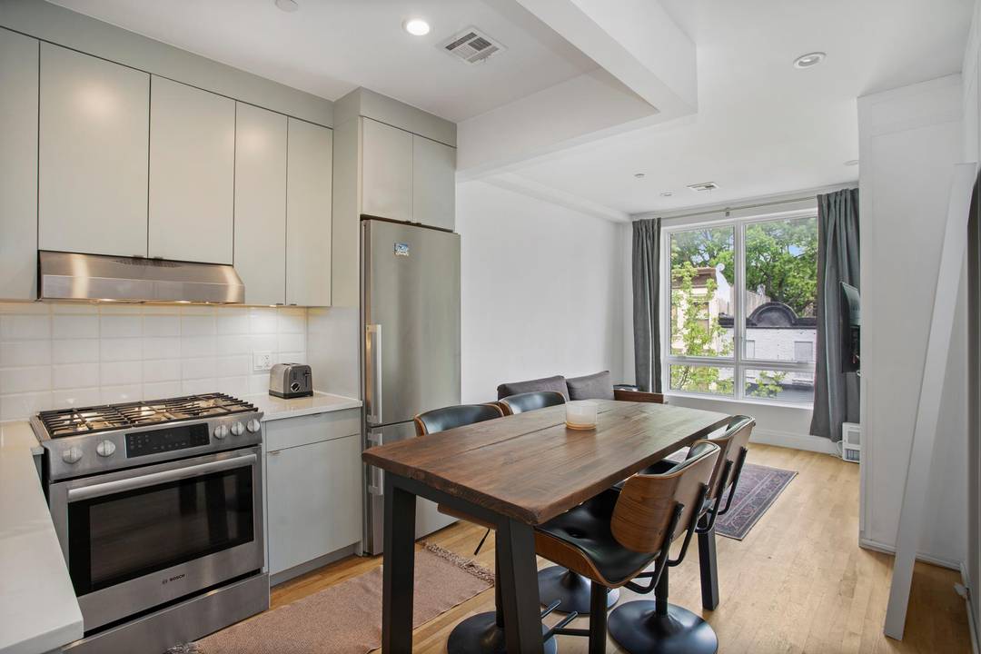 Best Value modern alcove Studio condo converted to a one bed under 450, 000 in Bedford Stuyvesant Low monthlies Laundry Roofdeck Storage !