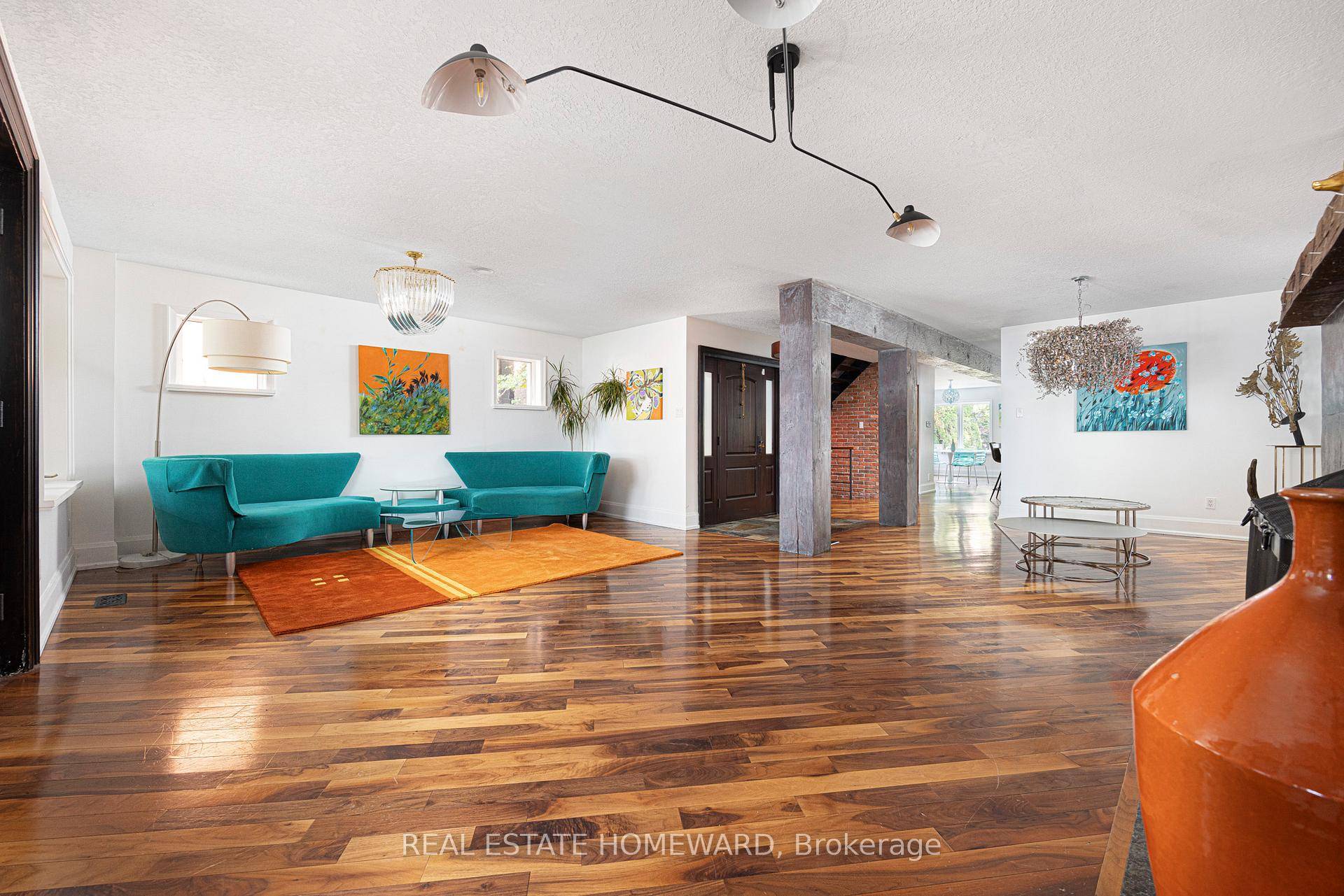 Welcome to this exceptional and spacious detached home, perfectly positioned to capture sweeping views of the beach and water beyond.