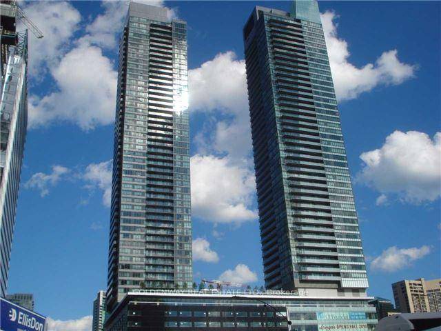 Absolutely immaculate large 1 bedroom plus den with lake view at Maple Leaf Square south tower.