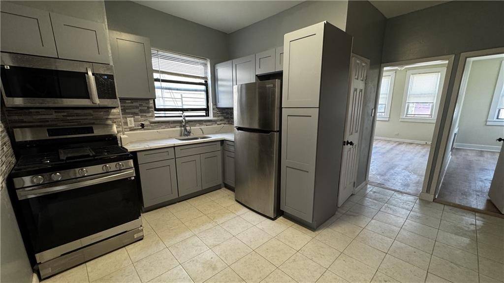 This is a fully detached 2 family home in East New York, Brooklyn, featuring a 4 bedroom unit on the top floor, a 2 bedroom unit on the first floor, ...