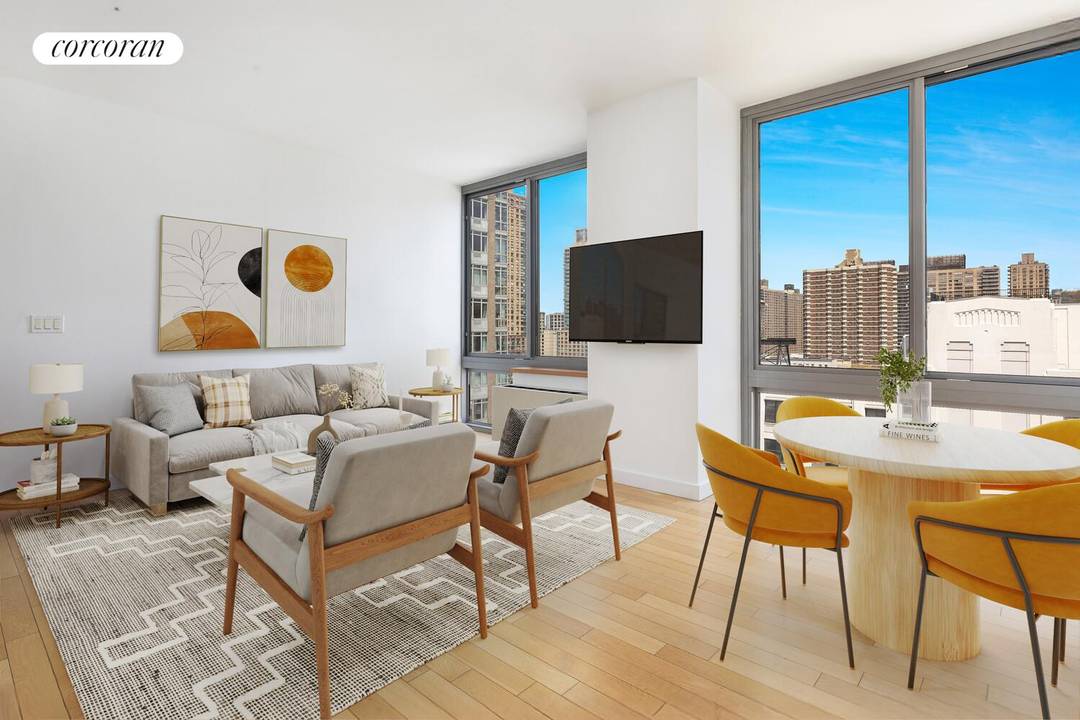 Sunlit two bedroom, two bathroom condominium with city views and in unit washer and dryer.