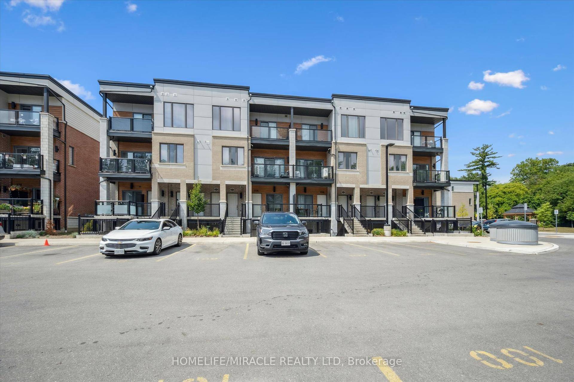 Welcome to this stunning end unit stacked townhome at 25 Isherwood Avenue, Cambridge.