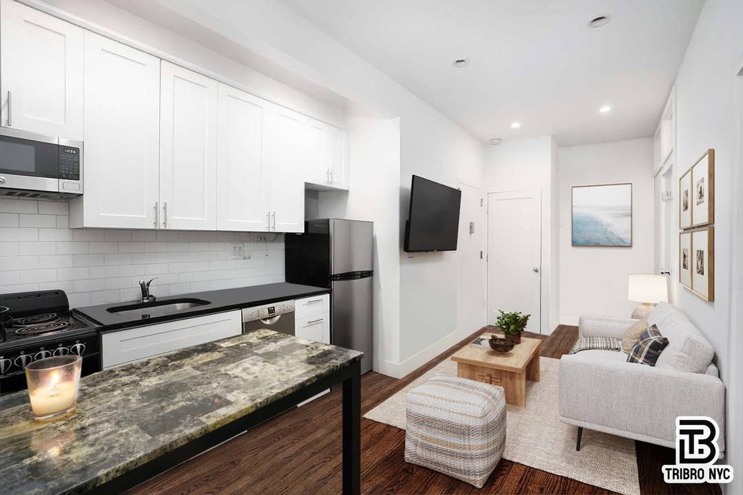 Modern Rent Stabilized 3BR 2BA in Prime East Village Sleek Finishes, in Unit W D, Dishwasher !