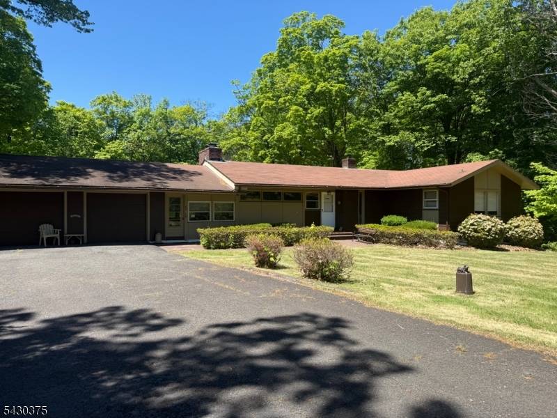 Welcome to this 4 bedrooms 3 full baths Ranch home which offers the perfect blend of privacy, comfort, and refined suburban living.