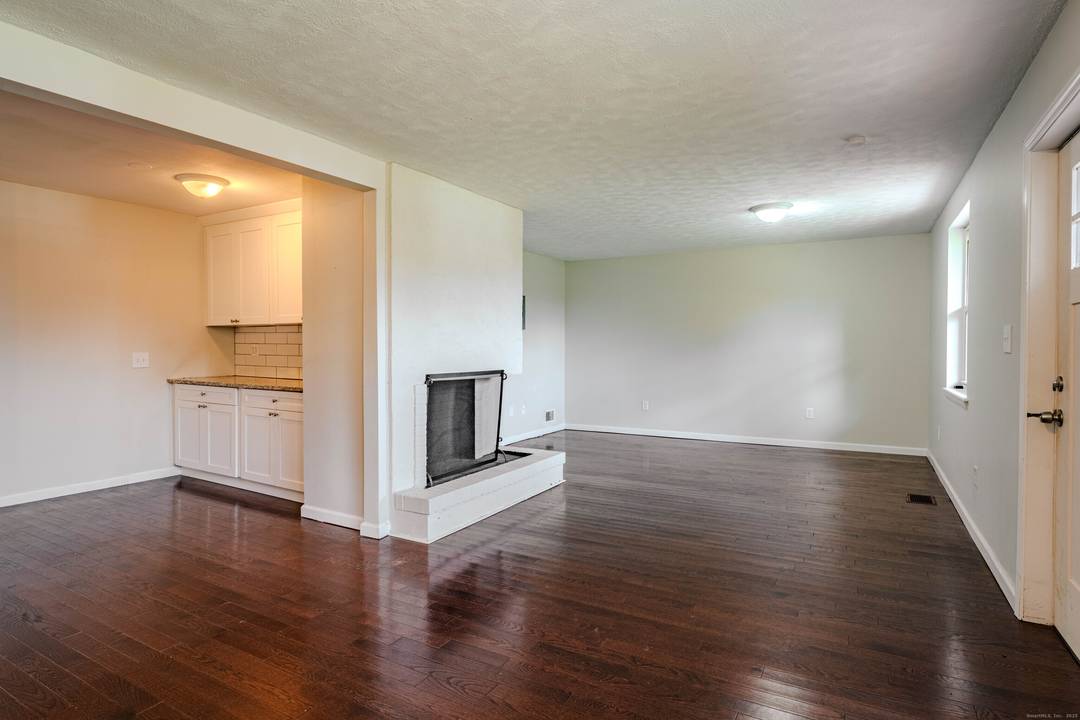 Charming Branford Home with Legal In Law Rental Apartment Perfect for First Time Buyers or Investors Discover the potential at 33 Orchard Hill Rd, Branford, CT a versatile ranch style ...