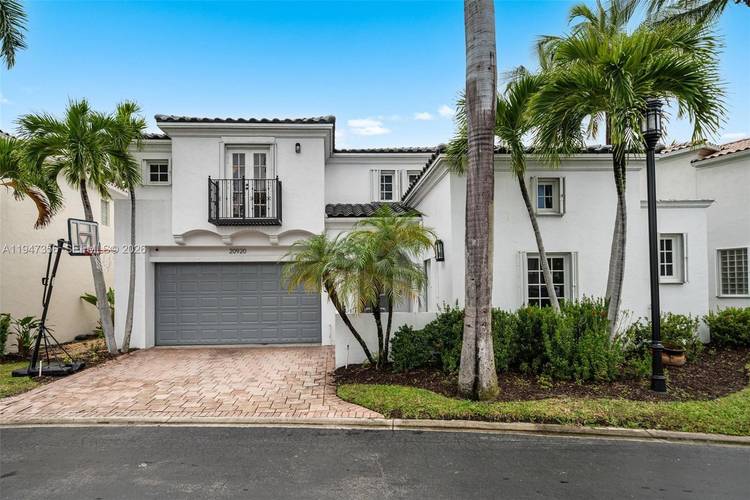Located in the heart of Aventura, this is a stunning two story residence designed for comfort, elegance, and modern living.