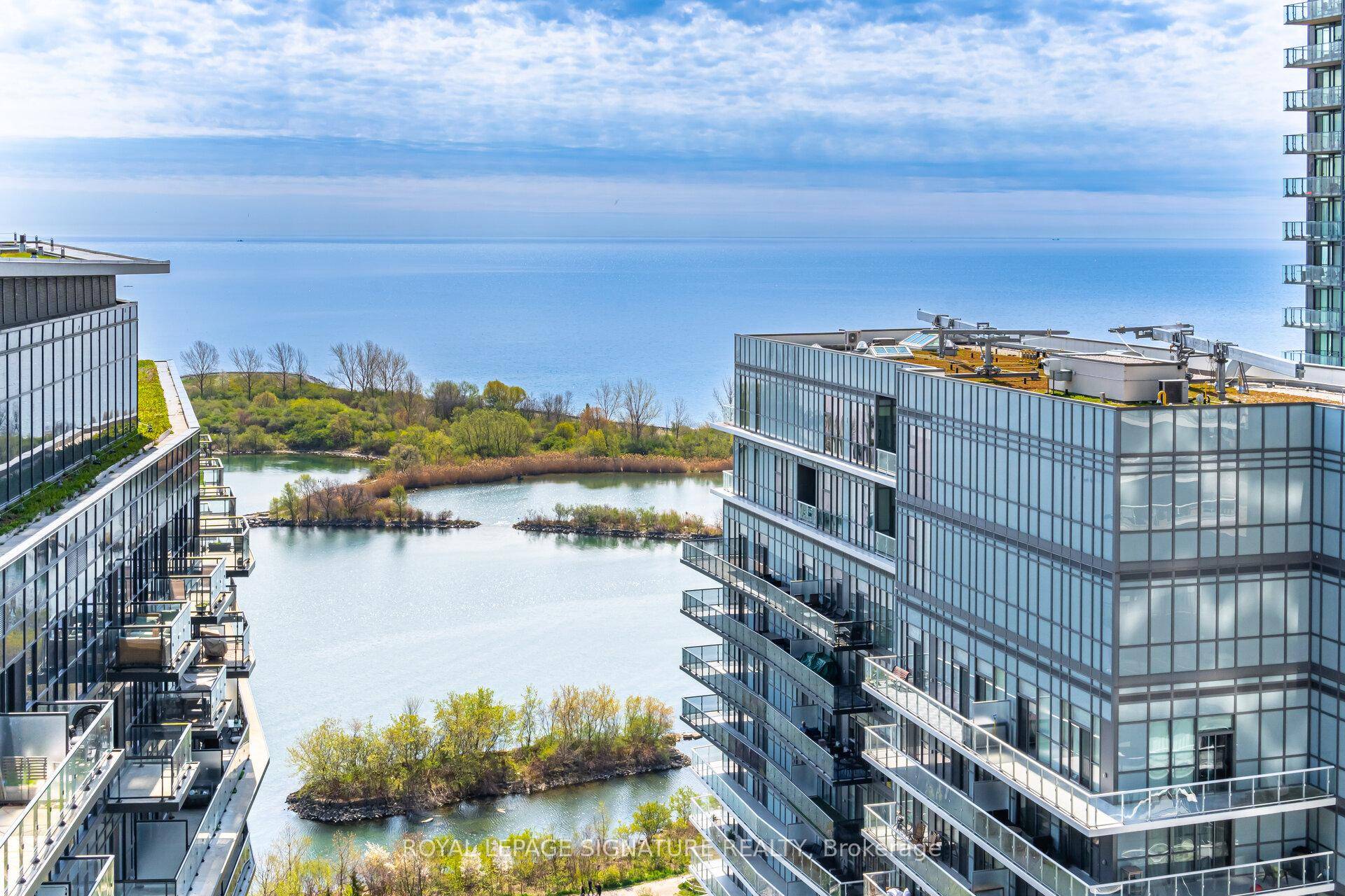 Brand New Modern one bedroom den unit is located at the desirable Water's Edge Condo, offering stunning lake views and a contemporary lifestyle.