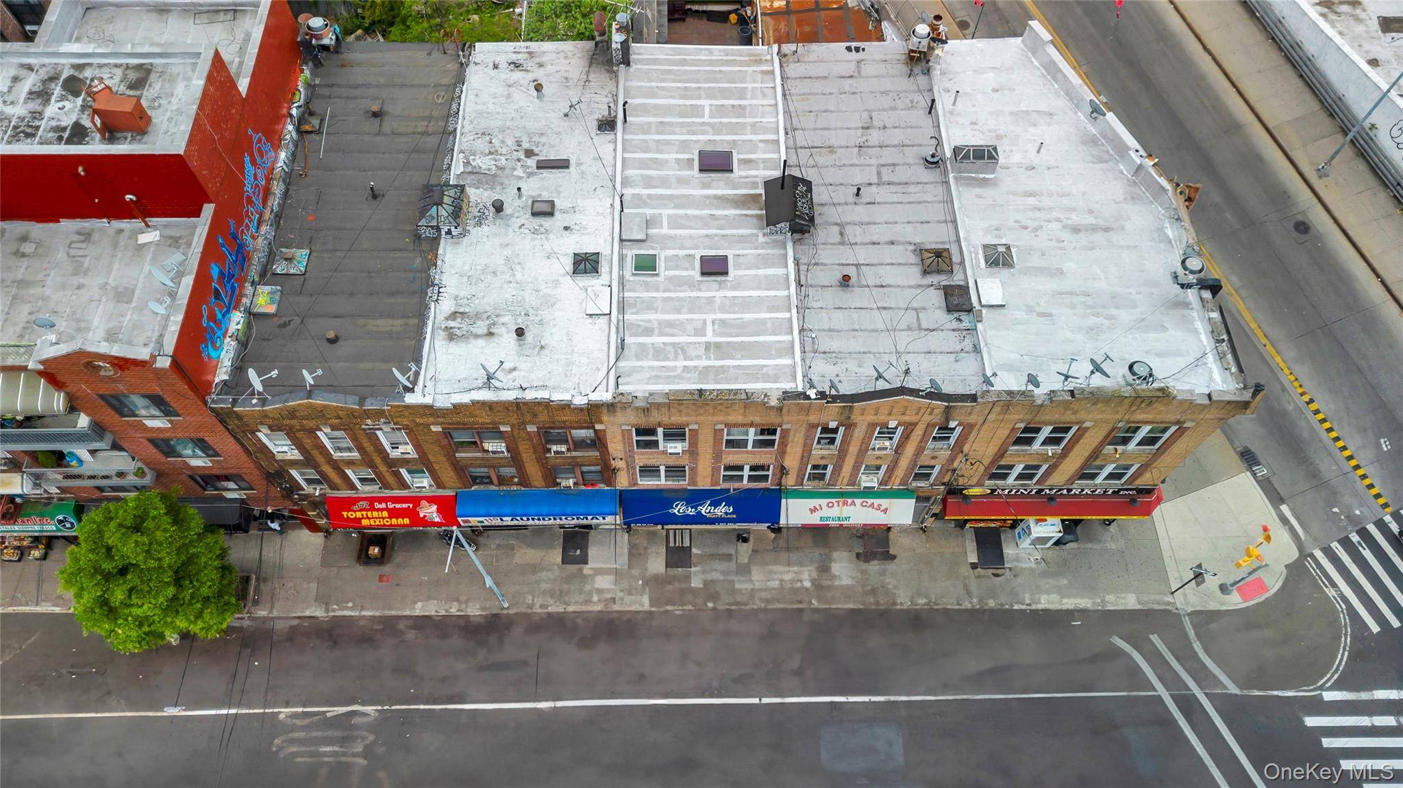 Mixed Use Property with Tremendous Potential in Prime Elmhurst Location !