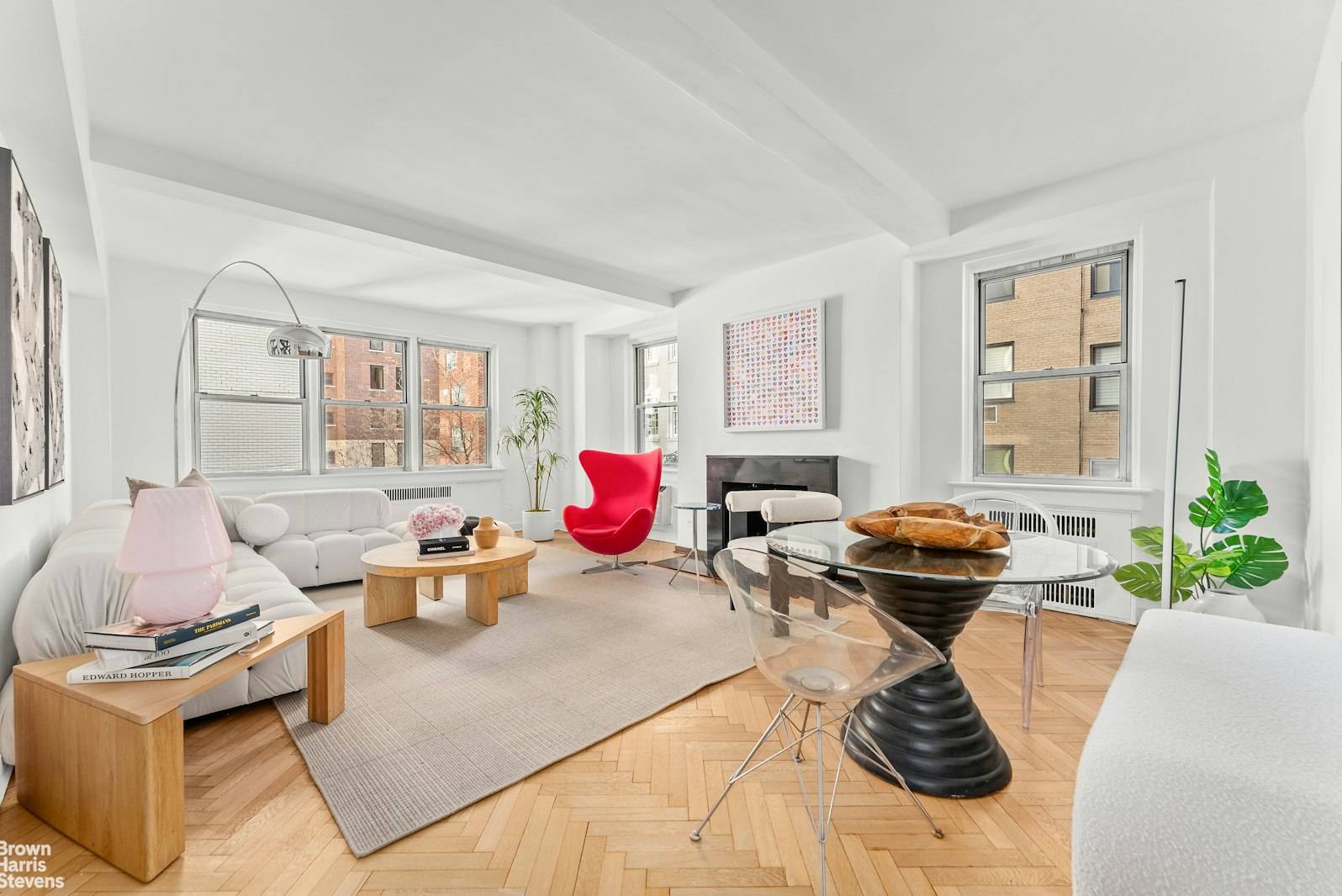 Nestled just off Fifth Avenue, this charming Pre War corner residence is a true gem that exudes warmth and elegance, offering an unparalleled sense of home.