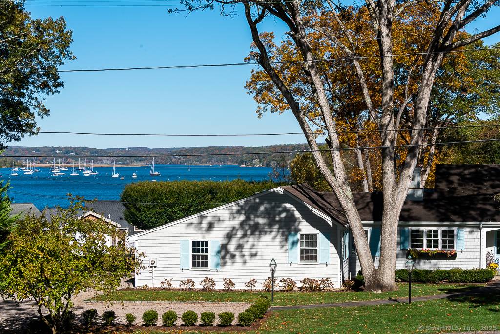 A sprawling luxury home offering one level living with stunning views of South Cove and quintessential Essex village beyond.
