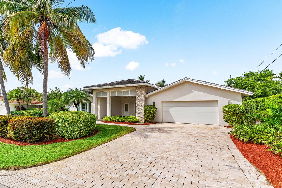 This stunning one story estate sits on an 85' x 132' quarter acre lot, just 350 yards from your neighborhood's private beach.
