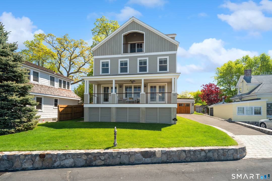Exceptional coastal living awaits in this beautifully appointed 4 bedroom, 3 full bath retreat in the coveted Harborview community.